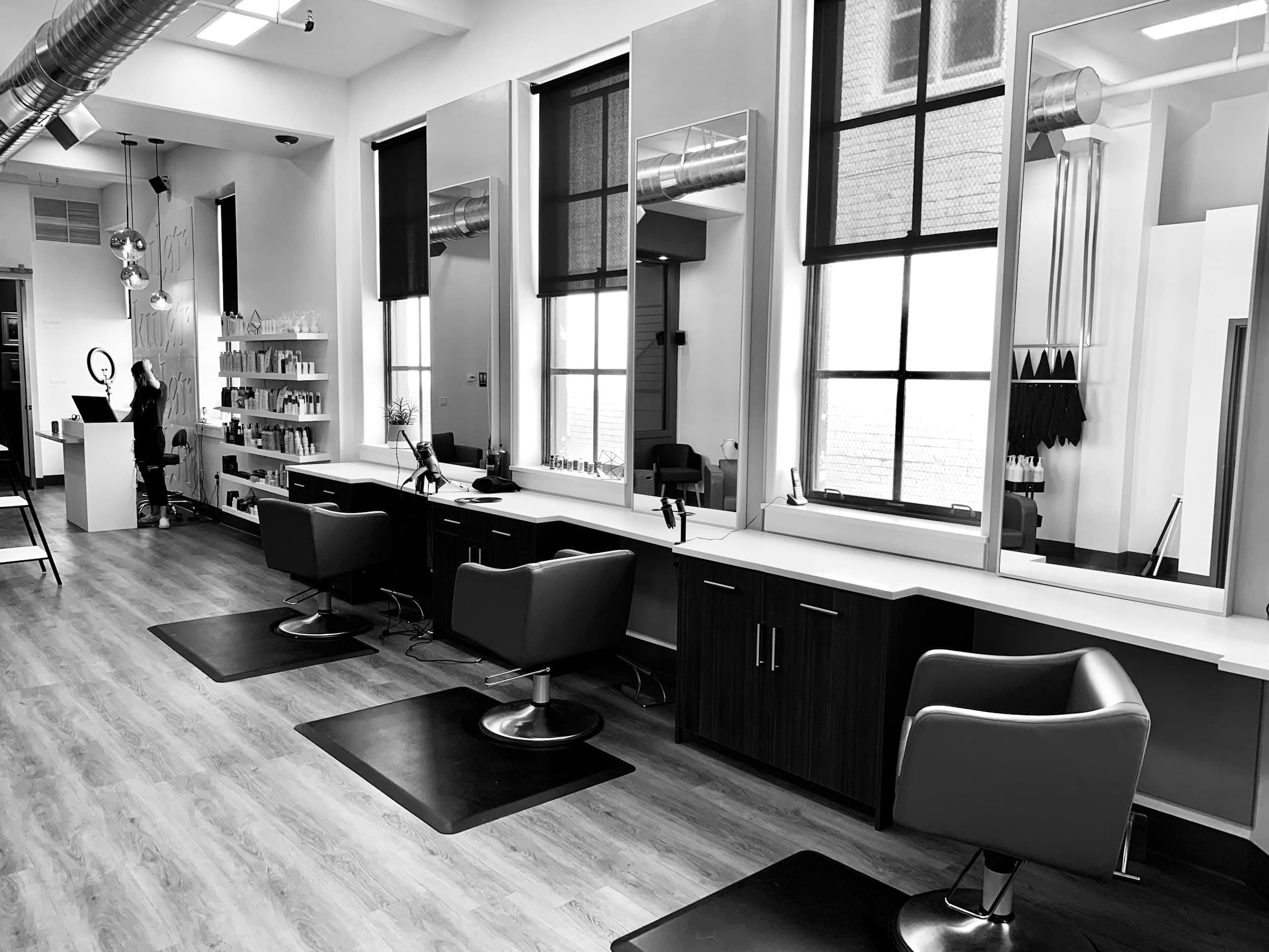 Modern upscale salon interior with styling chairs